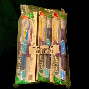 Blue and White Toothbrush Set